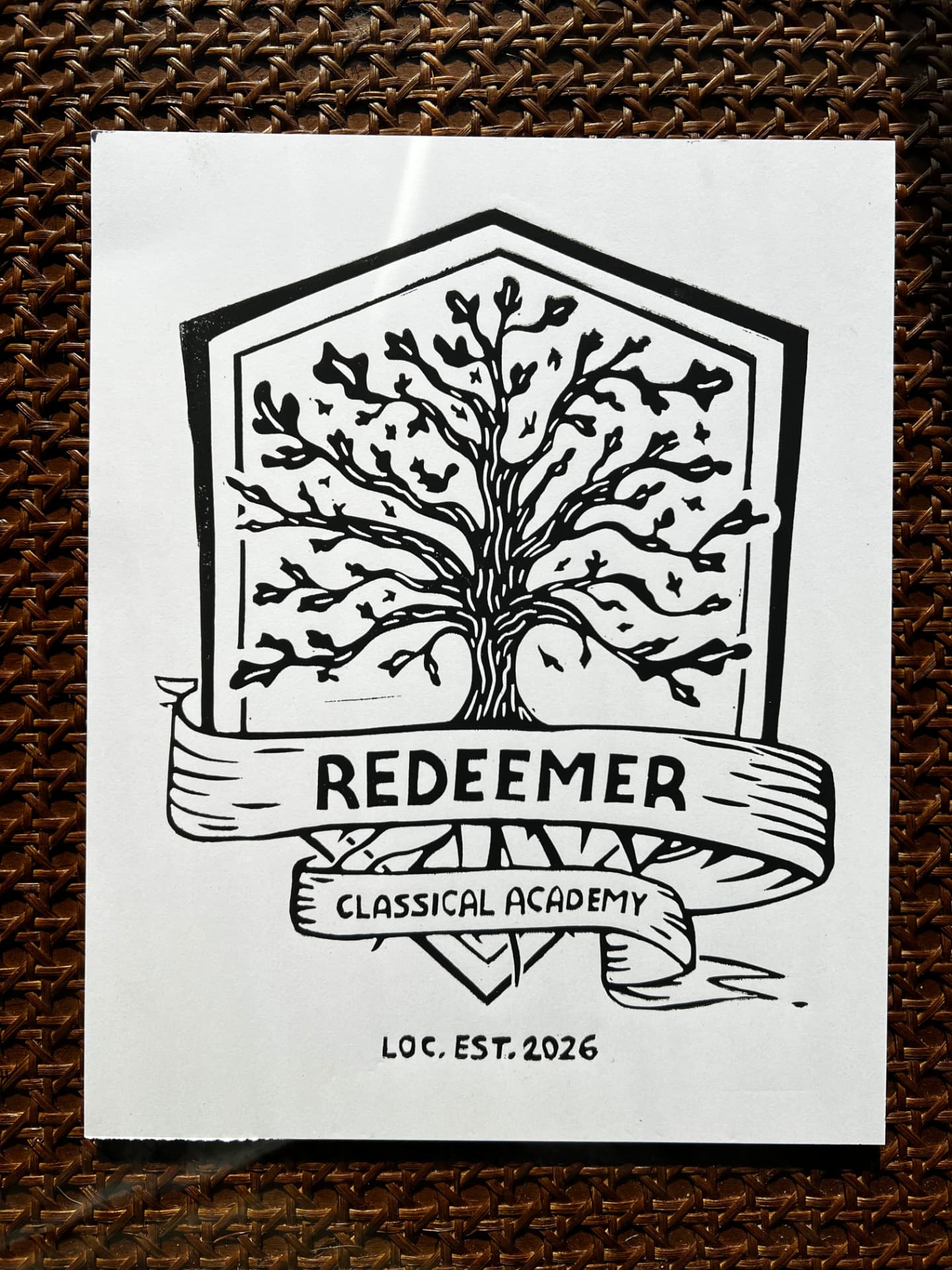 Hand-carved linocut block for the Redeemer Classical Academy crest